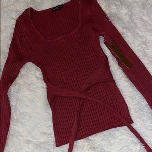 Tight fitting burgundy sweater!